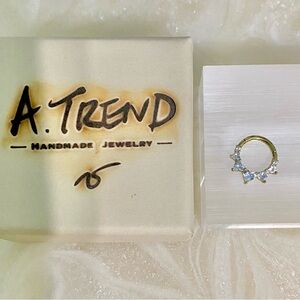 Elegant Gold and Sterling Silver hoop earring